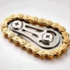Gear Chain Fidget Toy - Gold All-Metal EDC Fidget: on a desk in use