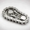 Finger Chain Gear Fidget Toy - Silver Metal EDC Fidget: on a desk in use