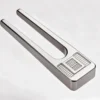 Tuning Fork Metal Mechanical Push Card - EDC Slider: on a desk in use